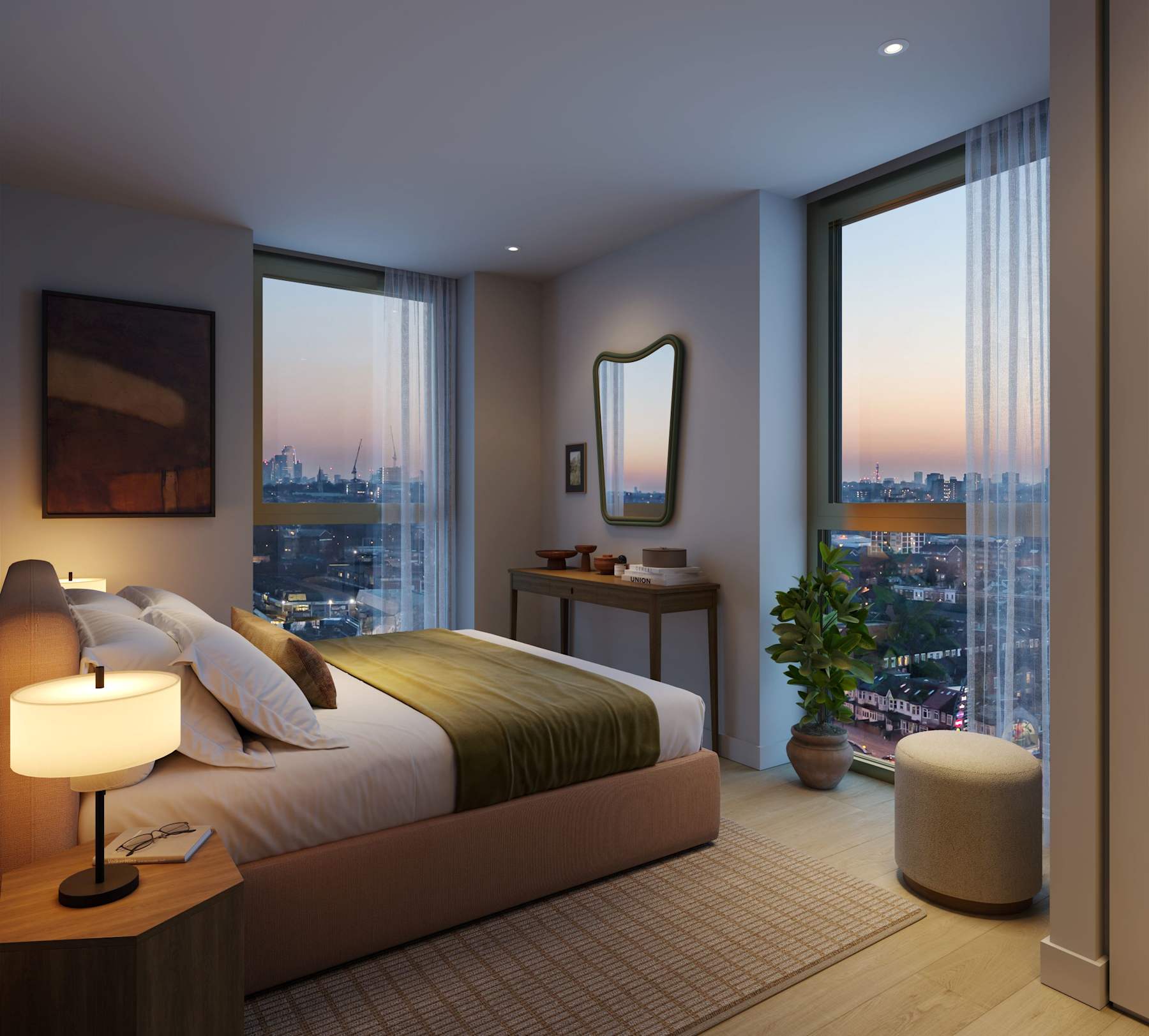 A bedroom with a large bed, bedside table and lamp